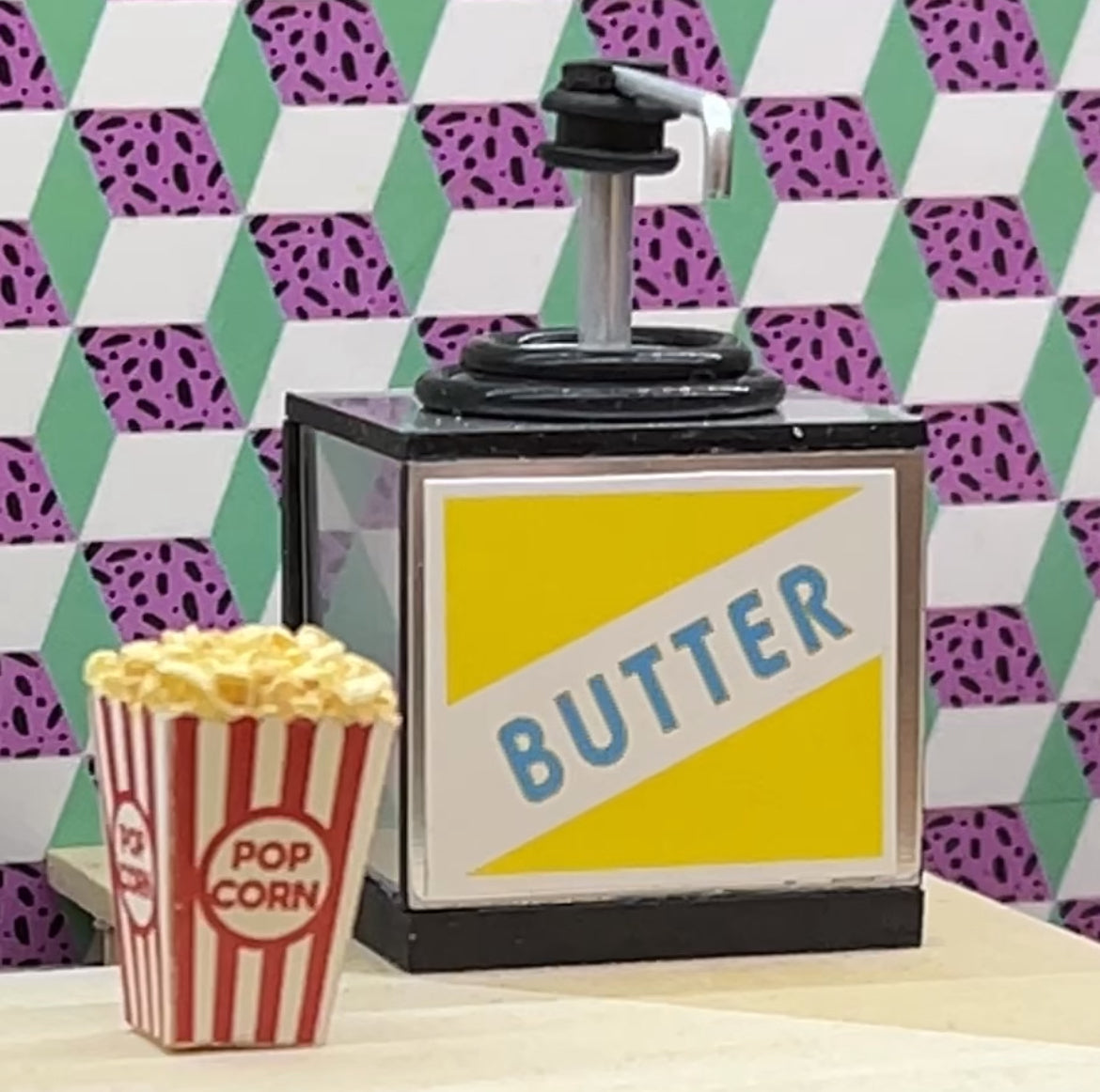 Butter Dispenser with Box of Popcorn